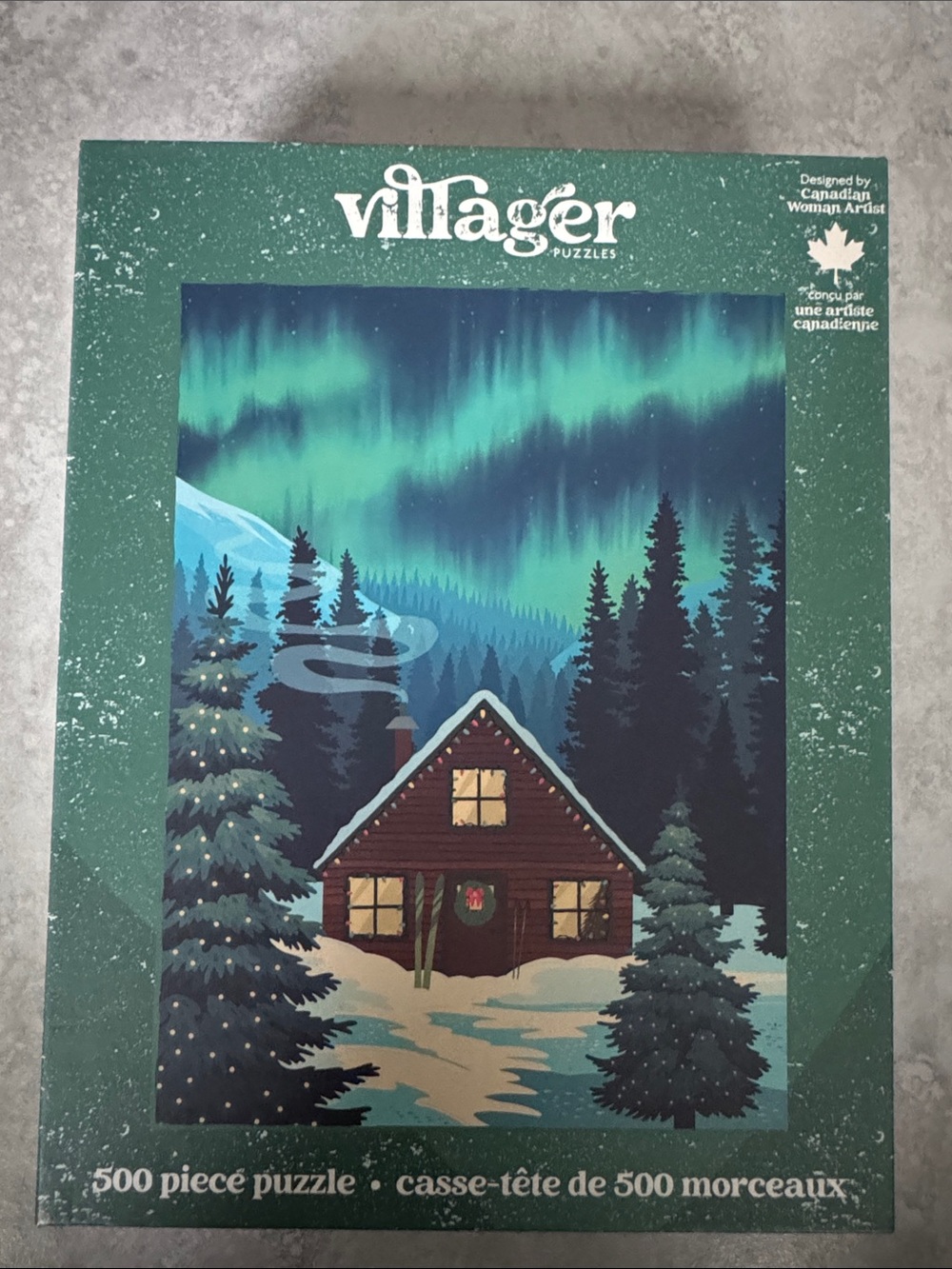 villager Green and Teal Northern Lights Cabin 500-Piece Puzzle